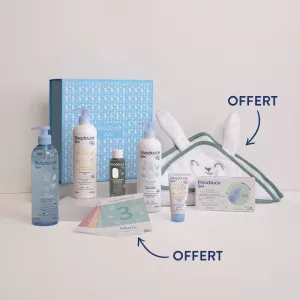 Image Coffret Bio Rivadouce Les Essentielles - Box et Pompe Bleue, Eau Nettoyante, Gel Doux, Crème de change, Sérum, Liniment, Huile de massage, Cape bain et Cartes premiers mois