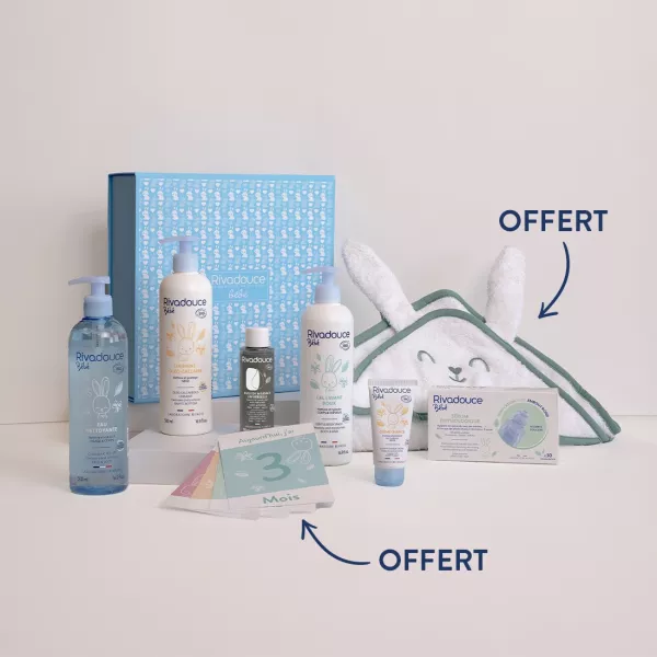 Image Coffret Bio Rivadouce Les Essentielles - Box et Pompe Bleue, Eau Nettoyante, Gel Doux, Crème de change, Sérum, Liniment, Huile de massage, Cape bain et Cartes premiers mois