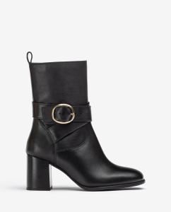 Image Bottines Femme Unisa avec brides croisées et fermeture à boucle - Noir ou Marron à 105€