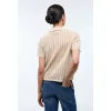 Image Polo en maille boutonné manches courtes - Beige clair à 20,99€