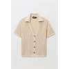 Image Polo en maille boutonné manches courtes - Beige clair à 20,99€