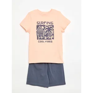 Image Pyjama 2 pièces Kiabi short + T-shirt - Orange ou Bleu à 5€