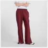 Image Pantalon de survêtement New Balance Post Season Pique Track Pant - Monarch Burgundy à 42,50€