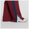 Image Pantalon de survêtement New Balance Post Season Pique Track Pant - Monarch Burgundy à 42,50€