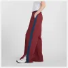 Image Pantalon de survêtement New Balance Post Season Pique Track Pant - Monarch Burgundy à 42,50€